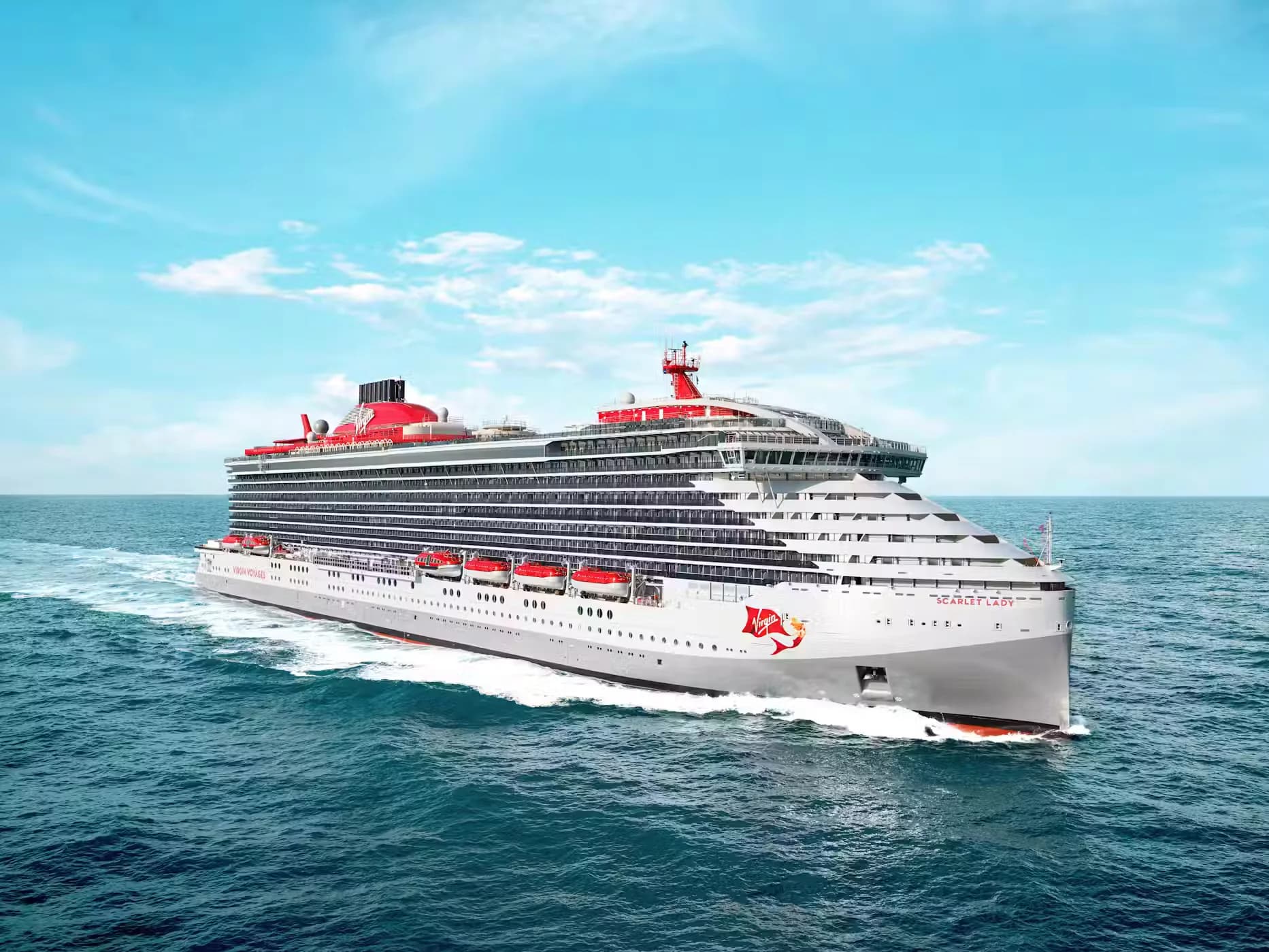 A large cruise ship named "Scarlet Lady" sailing on the ocean, featuring a sleek design with multiple decks and a prominent red logo on its side, under a clear blue sky.